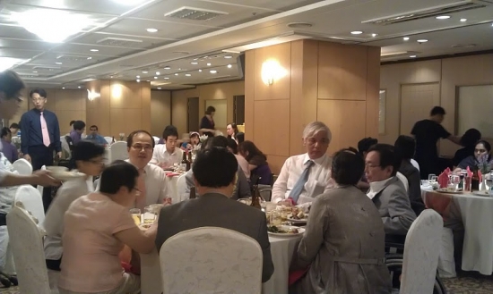 <p>
	The facilitators and participants sitting on their respective tables during the welcome dinner after the first day of meeting.</p>
