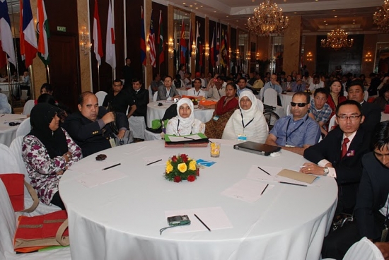 The participants in their respective tables during the workshop inside the workshop room.