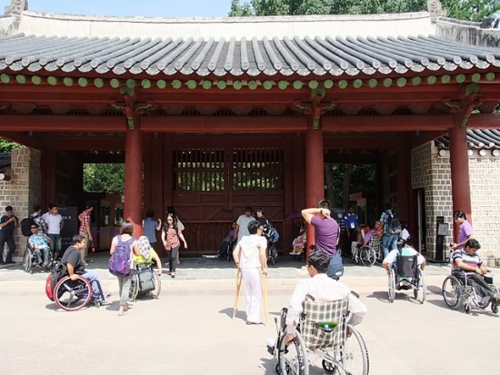 <p>
	The participants outside the shrine, at the entrance gate waiting for their tickets.</p>
