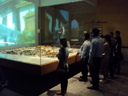 Chona Sabo, Regional Officer of DRPI-AP (left) with the group of participants (right) view a miniature model of Bangkok while listening to its breathtaking history. 