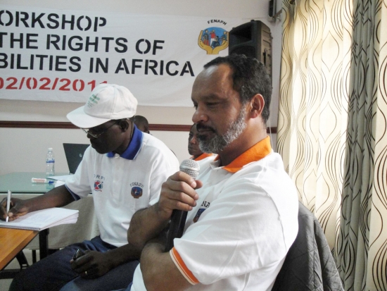 Moosa Salie speaks into a microphone