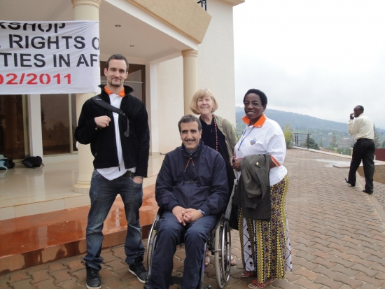 Chris Lytle, Marcia Rioux , Magdalena Kaihuzi and Mohamed El Khadiry pose outside the hotel