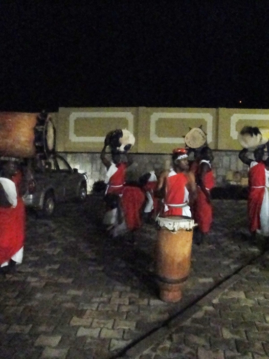 Many drummers carry and play drums outside the hotel at night