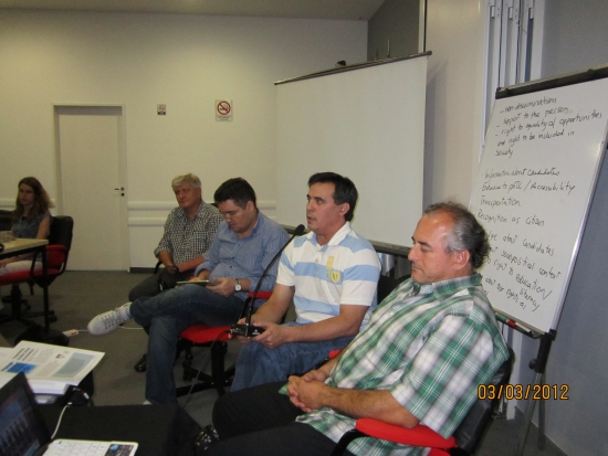 <p>
	Domingos Montagna, Alexandre Mapurunga, and Naziberto Oliveira sit as Ronaldo Bacry reports on Brazil. There are a number of flip charts visible behind them.</p>
