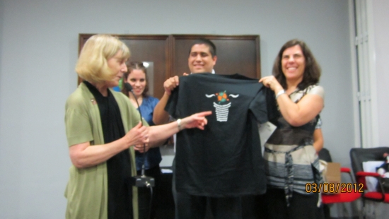 <p>
	Marcia Rioux is handing the DRPI tee-shirt to Jose Viera during the closing ceremony. Paula Pinto and Ver&oacute;nica Gonz&aacute;lez are on the side.</p>
