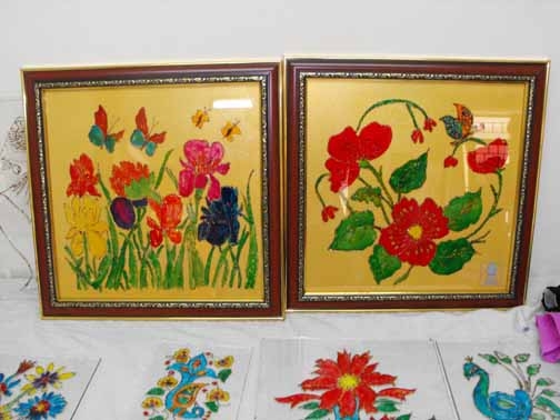 <p>Framed flower paintings made by trainees at the National Institute for the Mentally Handicapped</p>
