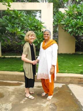 <p>Marcia Rioux poses outside on a sunny day with Kalpana Kannabiran, the Director of Council for Social Development.</p>
