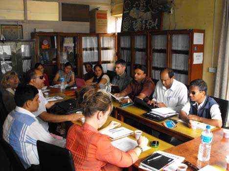 <p>NFDN Board Members and DRPI staff sitting around a table for a board meeting</p>
