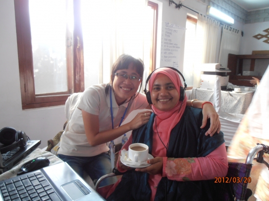 <p>
	Chenntay (left) and Misty (right) are smiling as their photo is taken at a coffee break during the training session. Misty holds a cup of coffee.</p>
