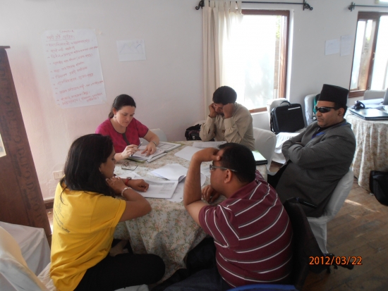 <p>
	Rita, Tika, Sagar and Mr. Birendra all sit around a table in the training room and have a discussion.</p>
