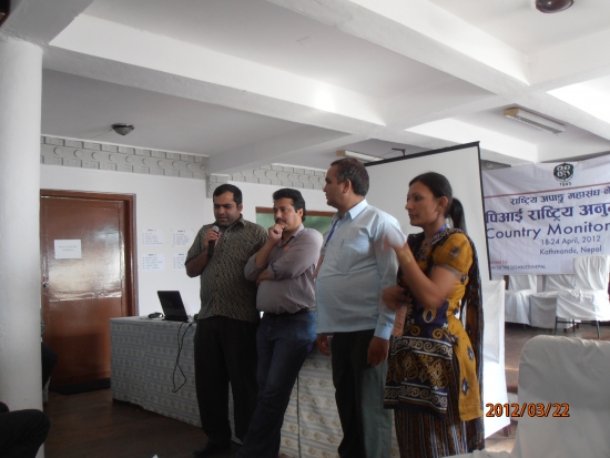 <p>
	Mr. Chintamani Paudel, Mr. Shishir Khanal, Mr. Kumar Regmi, and Ms. Ram Pyari Karki stand at the front of the training room. Mr Shishir Khanal holds the microphone.</p>
