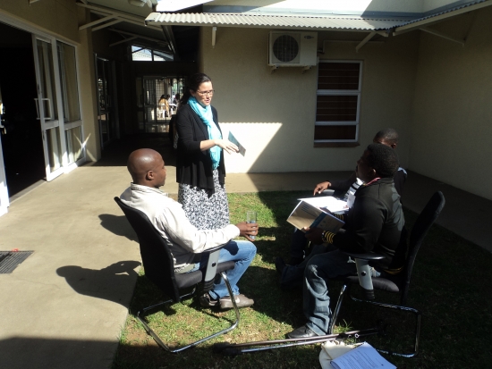 <p>
	Surprise Mugope, Tshepo Thibela and Sipho Mashego are are sitting outside of the training venue while Rita Samson looks on.</p>
