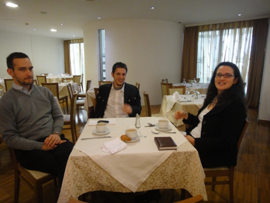 During a discussion at breakfast Chris Lytle, Rados Keravica and Rita Samson pose for a photo. 