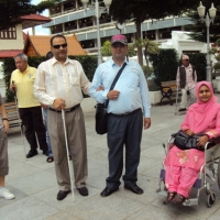 <p>
	Six people are shown in this picture, all are facing the camera.</p>
