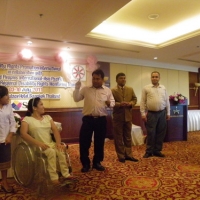 Participants from Nepal, Bangladesh, Camboadia and Laos gather together to sing, dance and clap during the closing ceremony. 