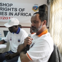 Moosa Salie speaks into a microphone