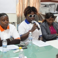 Roseweter Mudarikwa  speaks into a microphone
