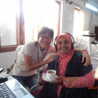 <p>
	Chenntay (left) and Misty (right) are smiling as their photo is taken at a coffee break during the training session. Misty holds a cup of coffee.</p>
