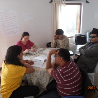 <p>
	Rita, Tika, Sagar and Mr. Birendra all sit around a table in the training room and have a discussion.</p>
