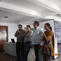 <p>
	Mr. Chintamani Paudel, Mr. Shishir Khanal, Mr. Kumar Regmi, and Ms. Ram Pyari Karki stand at the front of the training room. Mr Shishir Khanal holds the microphone.</p>
