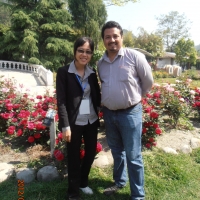 <p>
	Chenntay (left) and Kumar (right) are standing beside the rose garden to have their picture taken.</p>
