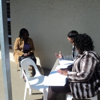 <p>
	Roseweter Mudarikwa is sitting in front of a table in interview with Imtiaza Moola and Zama Ngwenya outside of the training venue.</p>
