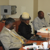 <p>
	South Africa Team: from left to right: Jace Nair, Bongiwe Malope and Muzi Nkosi seated at a table.</p>
